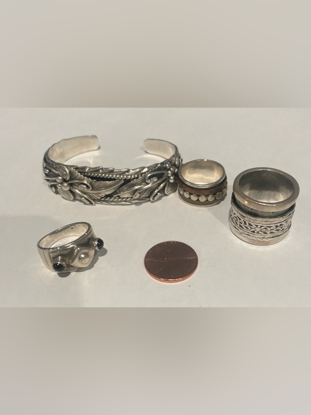 Sterling Silver bracelet and 3 rings, all sterling 925